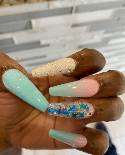 Elegant gel nail art with floral patterns - West Chester nail salon